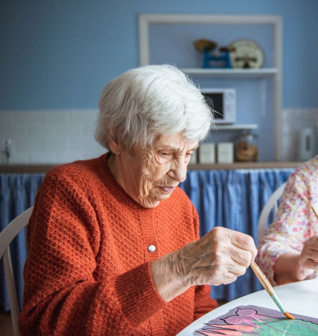Elderly-Lady-Painting-Using-Aquapaint